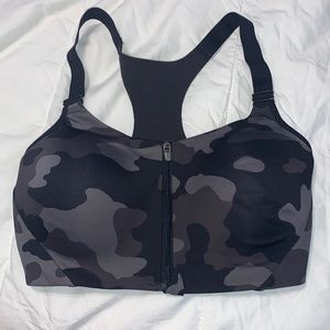 Sports bra , camp print, was only put once and didn’t fit. Zipper front